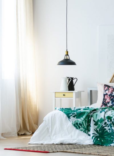 Bright and cozy bedroom interior in modern home